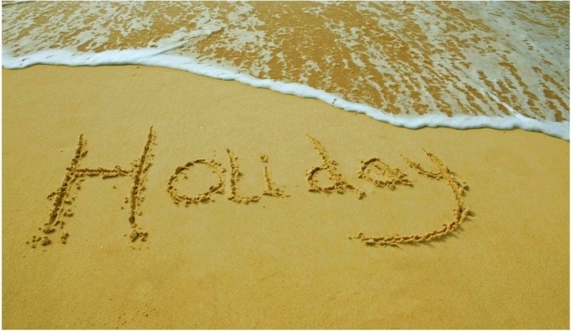 Nápis v písku Holiday